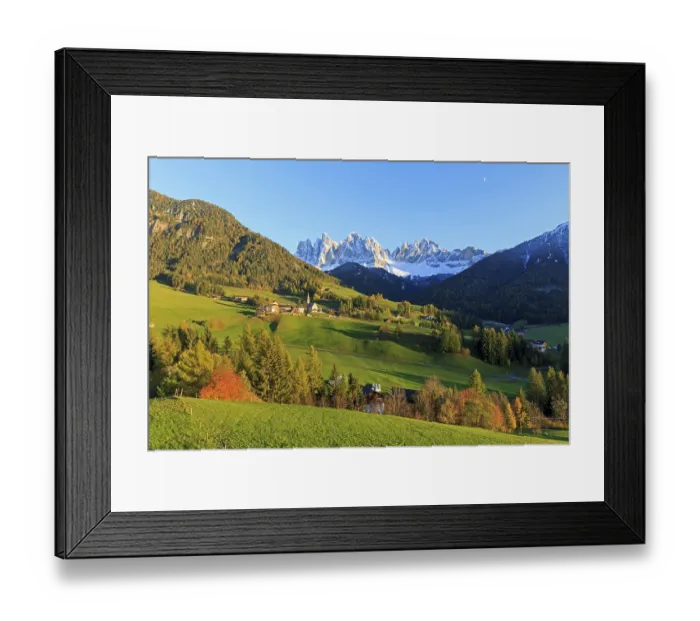 Framed Print : Idyllic landscape with village surrounded by meadows and a mountain panorama Framed Print : Idyllic landscape with village surrounded by meadows and a mountain panorama