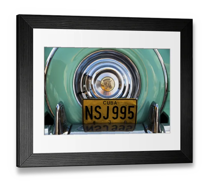 Framed Print : Rear view of an old Cadillac, spare wheel cover