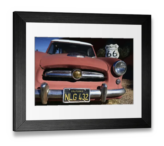 Framed Print : Vintage car in front of the Giganticus Headicus store on Route 66