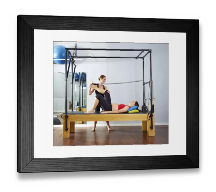 Framed Print : Pregnant woman pilates reformer leg spring exercise workout with personal trainer Framed Print : Pregnant woman pilates reformer leg spring exercise workout with personal trainer