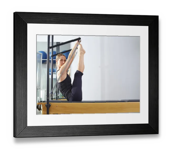 Framed Print : Pilates woman in reformer monki exercise at gym indoor Framed Print : Pilates woman in reformer monki exercise at gym indoor
