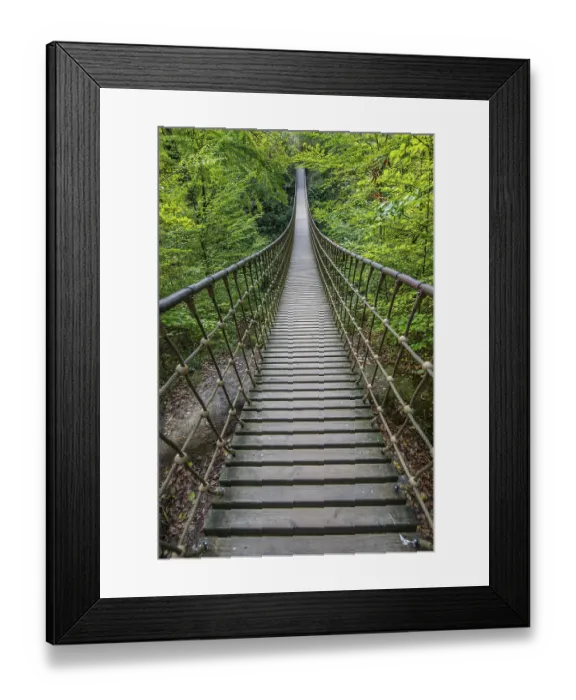 Framed Print : Wooden suspension bridge over a gorge Framed Print : Wooden suspension bridge over a gorge