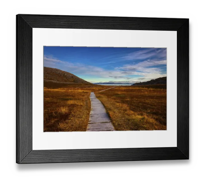 Framed Print : Wooden path in the open-air museum of Forsol towards the bay