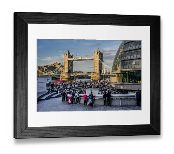 Framed Print : Spectators at The Scoop amphitheatre with London City Hall and Tower Bridge over the Thames in the evening sun