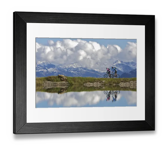 Framed Print : Mountain bikers, male and female