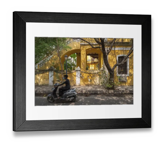 Framed Print : Old colonial villa on a street