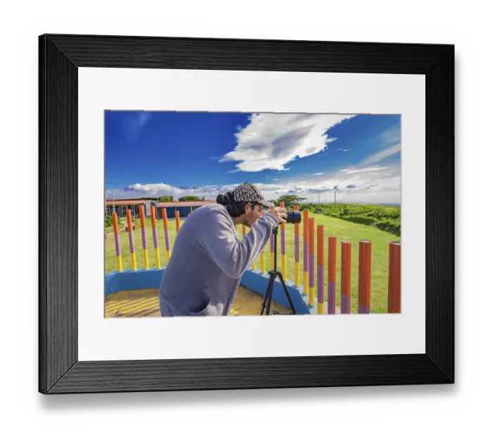 Framed Print : Photographer photographing a beautiful landscape Framed Print : Photographer photographing a beautiful landscape