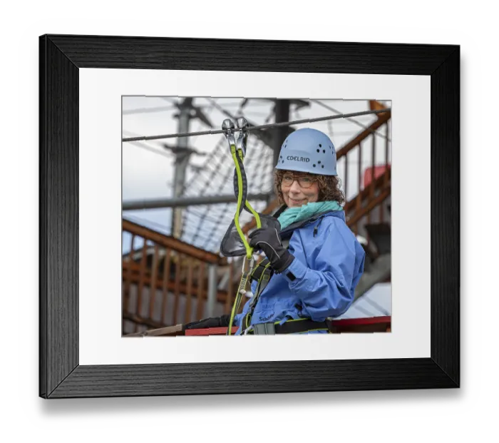 Framed Print : Sporty woman climbing in an outdoor park Framed Print : Sporty woman climbing in an outdoor park