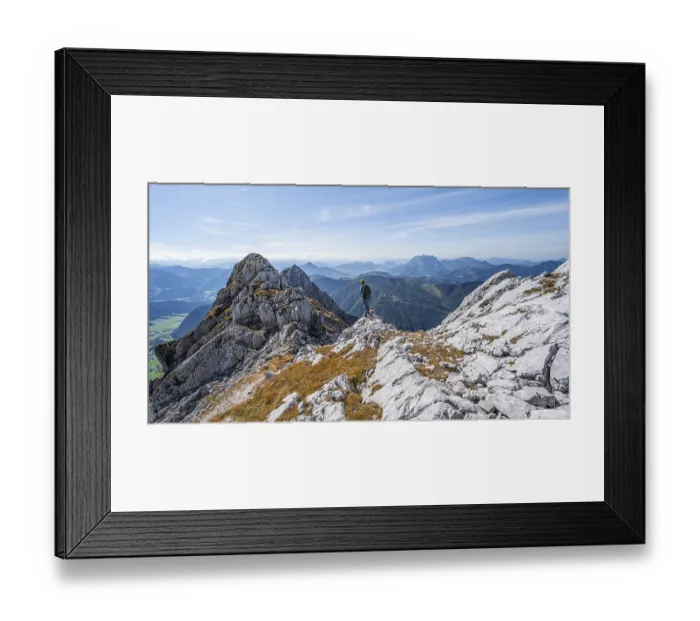 Framed Print : Hiker with climbing helmet, on hiking trail at a ridge Framed Print : Hiker with climbing helmet, on hiking trail at a ridge