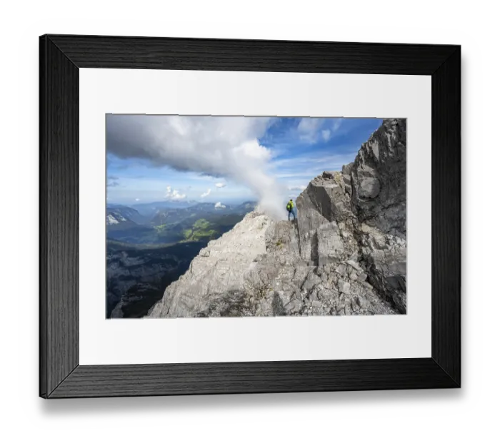 Framed Print : Mountaineer on a narrow rocky ridge Framed Print : Mountaineer on a narrow rocky ridge