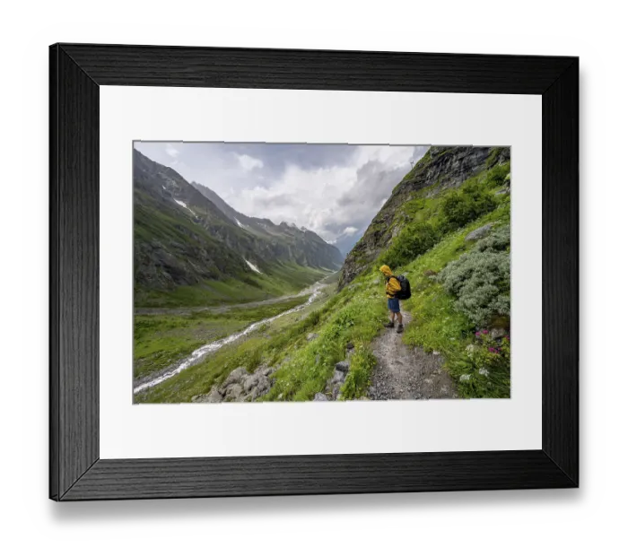 Framed Print : Mountaineer on a hiking trail, green mountain valley Floitengrund with mountain stream Floitenbach Framed Print : Mountaineer on a hiking trail, green mountain valley Floitengrund with mountain stream Floitenbach