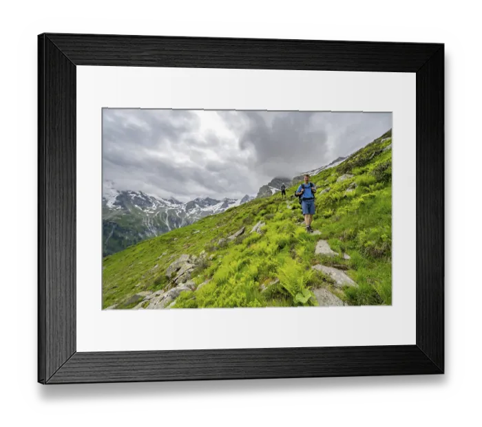 Framed Print : Mountaineers between green vegetation on a hiking trail Framed Print : Mountaineers between green vegetation on a hiking trail