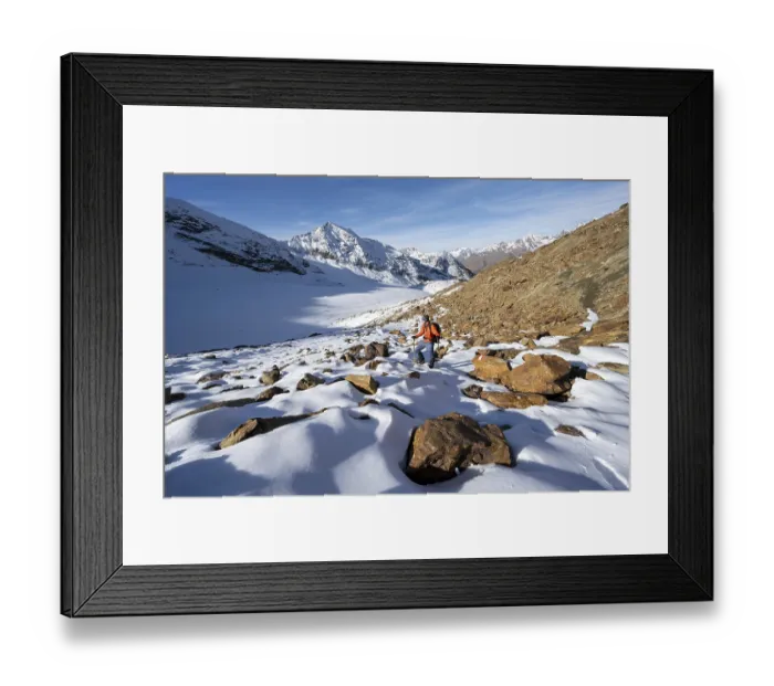 Framed Print : Mountaineer on a hiking trail with snow Framed Print : Mountaineer on a hiking trail with snow