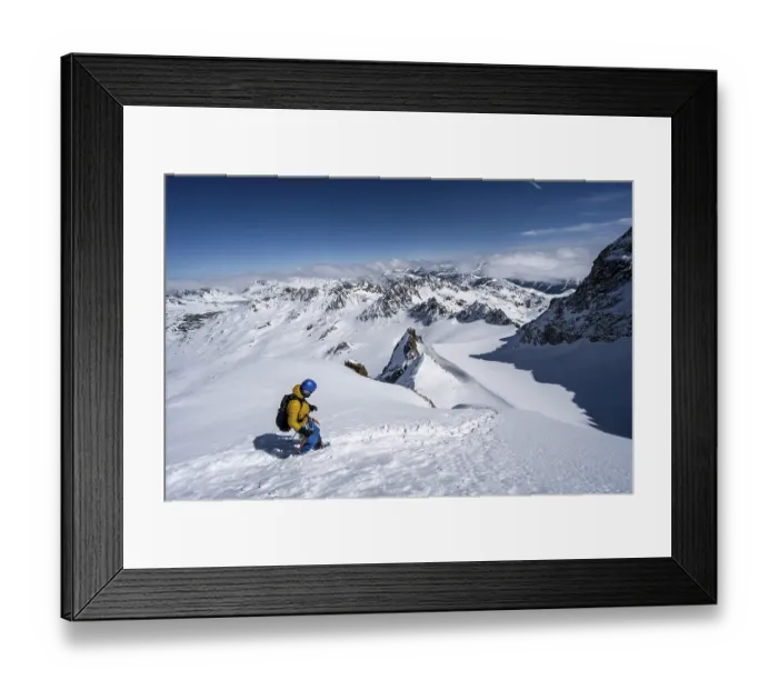 Framed Print : Mountaineer with ice axe and crampons