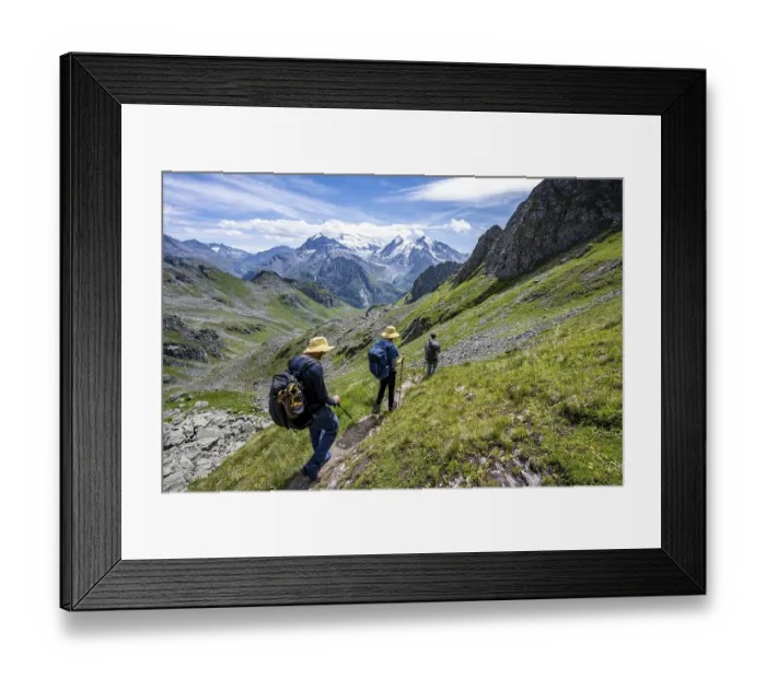 Framed Print : Mountaineer on hiking trail in mountain landscape