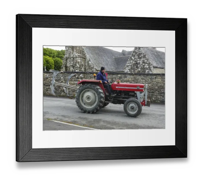 Framed Print : Old tractor Massey Ferguson 140 in front of church and chapel Sainte Nonne Framed Print : Old tractor Massey Ferguson 140 in front of church and chapel Sainte Nonne