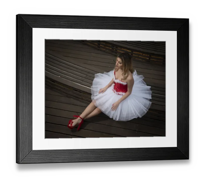 Framed Print : Ballerina wearing christmas white red dress posing on the floor Framed Print : Ballerina wearing christmas white red dress posing on the floor