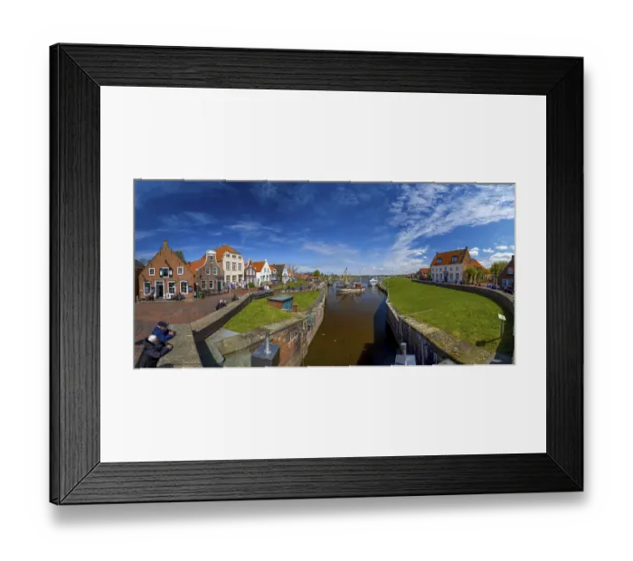 Framed Print : Historic houses at Greetsiel harbour