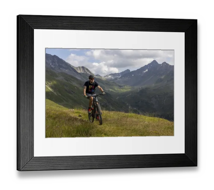 Framed Print : Mountain biker on an alpine bike trail Framed Print : Mountain biker on an alpine bike trail