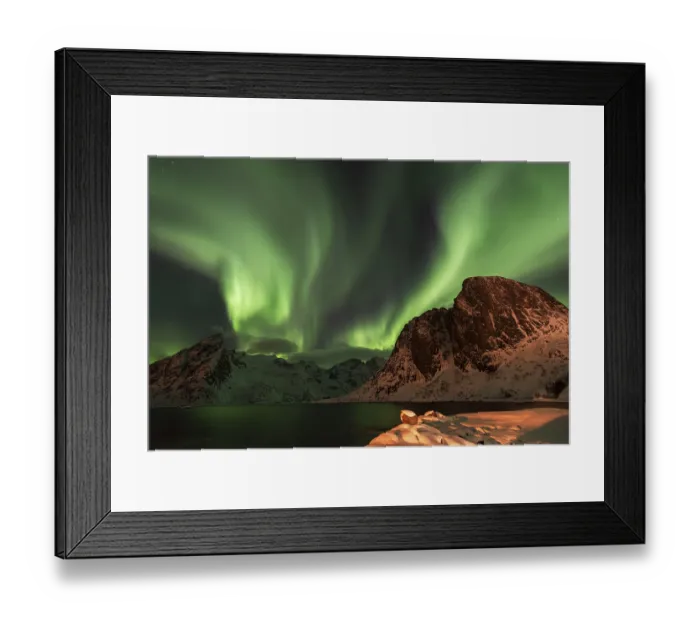 Framed Print : Northern lights over snow-capped mountains