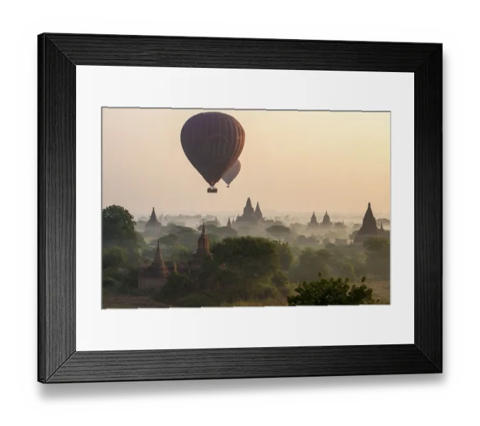 Framed Print : Hot air balloons over the landscape in the early morning fog Framed Print : Hot air balloons over the landscape in the early morning fog