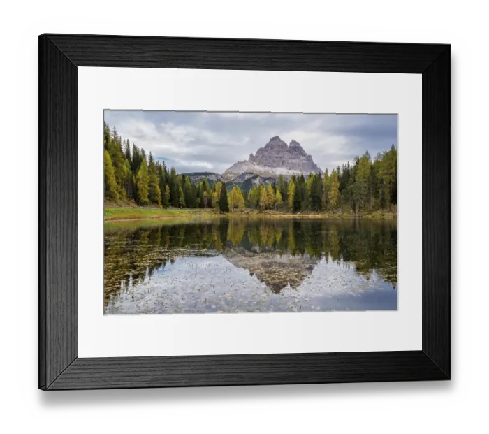 Framed Print : Tre Cime di Lavaredo peaks and Lake Antorno with sky reflection in calm water