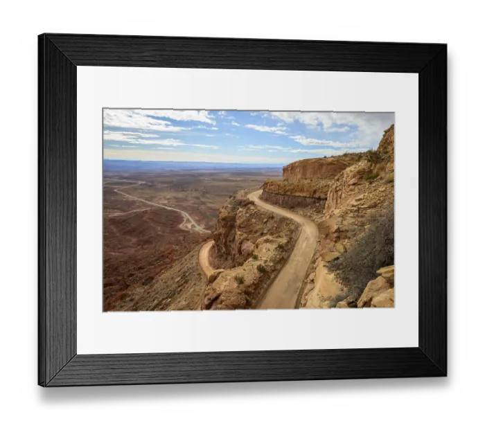 Framed Print : Moki Dugway leads in serpentines through the steep face of the Cedar Mesa