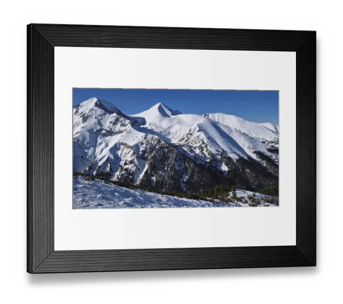 Framed Print : Aerial view above the Pirin mountains with rocky peaks covered with snow