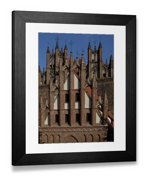 Framed Print : Pinnacles of the west gables of Trinitatis Church and St Anne's Church in front