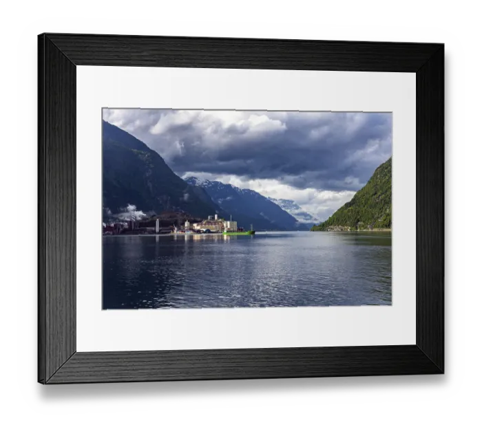 Framed Print : Small town of Odda. Magnificent Hardanger fjord between forested mountains