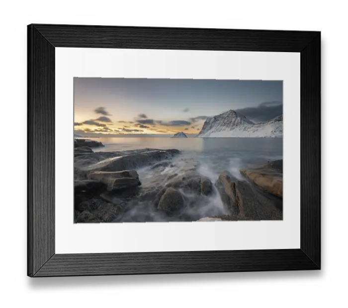 Framed Print : Rocky coast Haukland Beach in the evening light