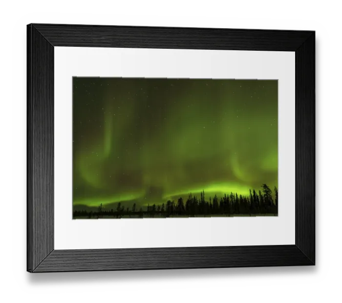 Framed Print : Northern Lights (Aurora borealis) over snowy landscape