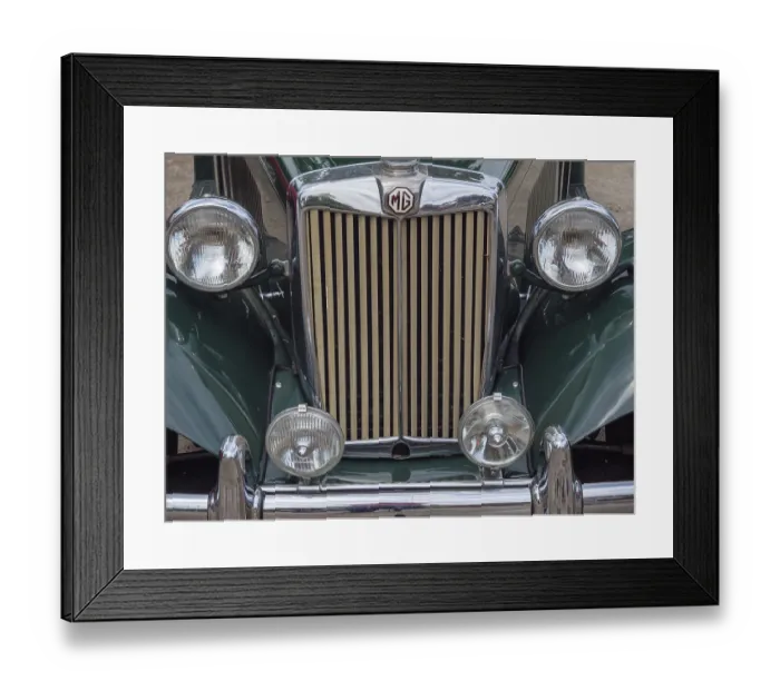 Framed Print : Front view of a vintage MG with distinctive radiator grille and double chrome-plated headlights Framed Print : Front view of a vintage MG with distinctive radiator grille and double chrome-plated headlights