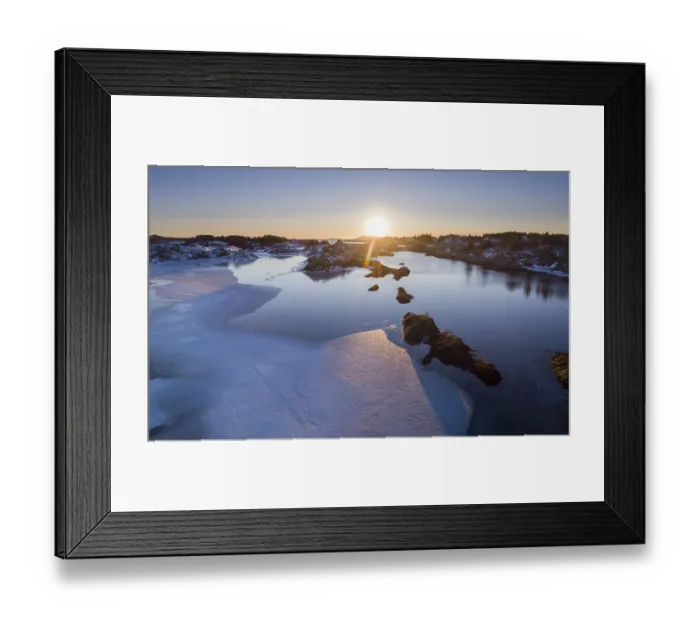 Framed Print : Low sun over a half frozen fjord Framed Print : Low sun over a half frozen fjord