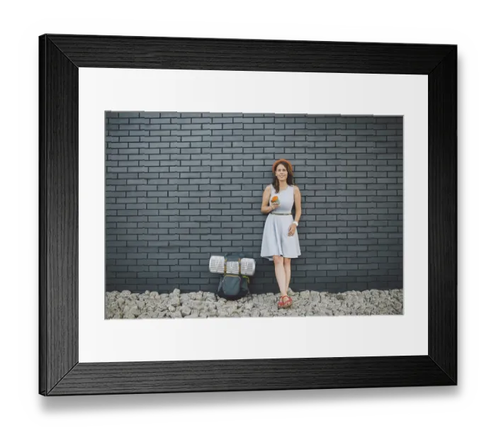 Framed Print : Cheerful girl in dress holding take away cup