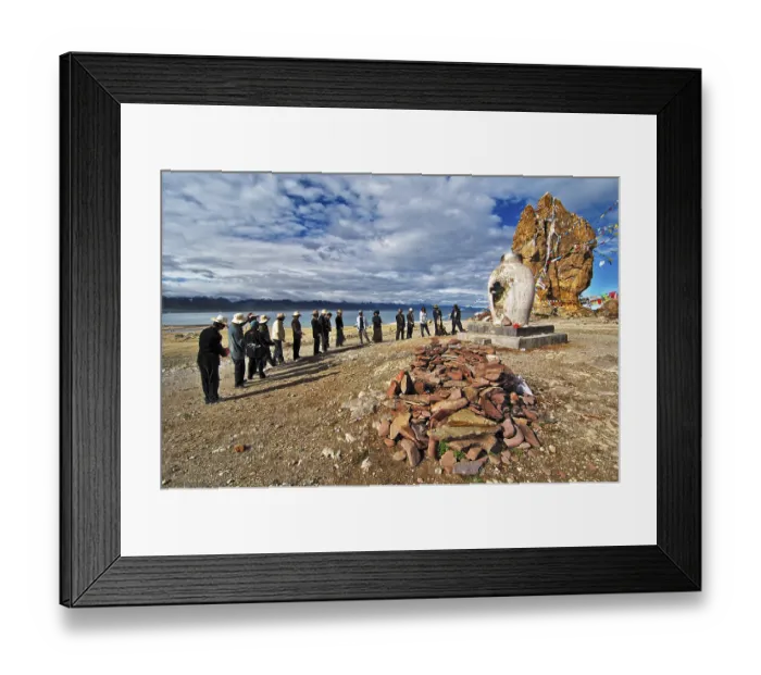Framed Print : Tibetians at the sacrifice hearth next to the Stone Couple with prayer flags