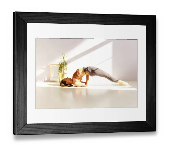 Framed Print : Side view of calm female in sportswear practicing yoga in Firefly pose while balancing on arms