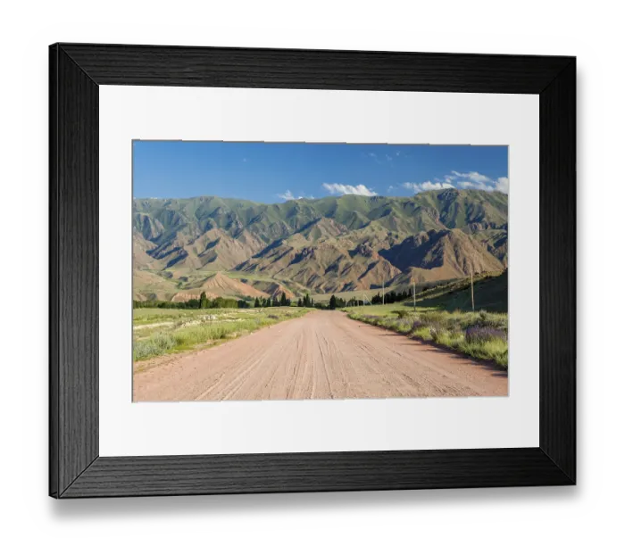Framed Print : Wide country road in Tien Shan mountains
