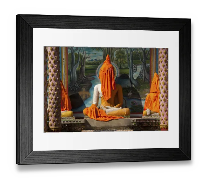 Framed Print : Buddha statue covered with orange fabrics