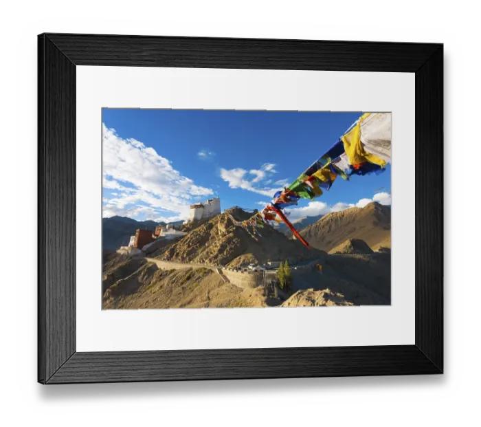 Framed Print : Tibetan prayer flags lead to Tsemo Fort