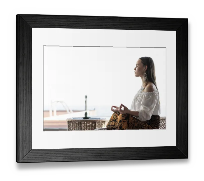 Framed Print : Woman meditating outdoors