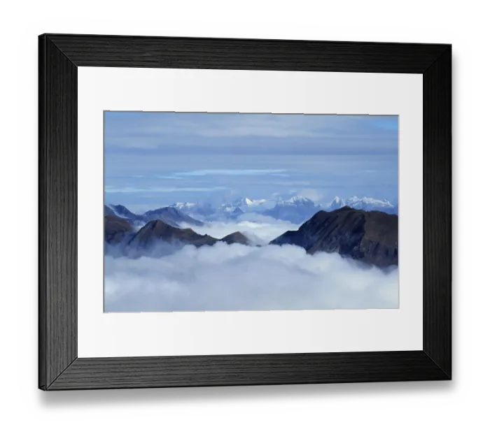 Framed Print : Alpine peaks above clouds, Bernese Oberland (overview) (Europe) (landscapes) (mountains) (landscape) (horizontal) Framed Print : Alpine peaks above clouds, Bernese Oberland (overview) (Europe) (landscapes) (mountains) (landscape) (horizontal)