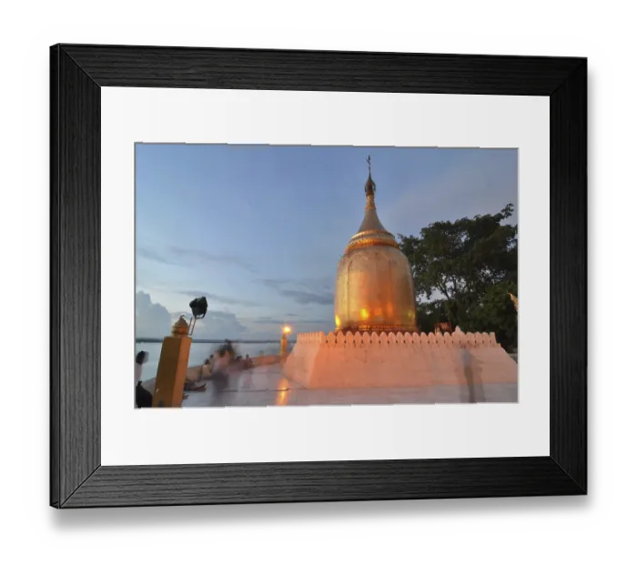 Framed Print : Burmese visitors and pilgrims at the gilded Bupaya Pagoda at the Ayeyarwady river in the evening light Framed Print : Burmese visitors and pilgrims at the gilded Bupaya Pagoda at the Ayeyarwady river in the evening light