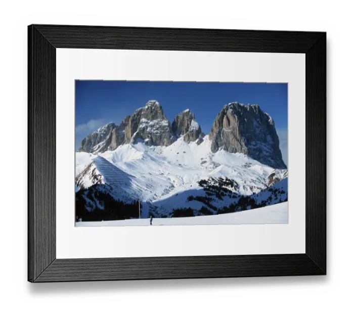 Framed Print : Ski slope at Pordoi Pass and mountain Langkofel in winter