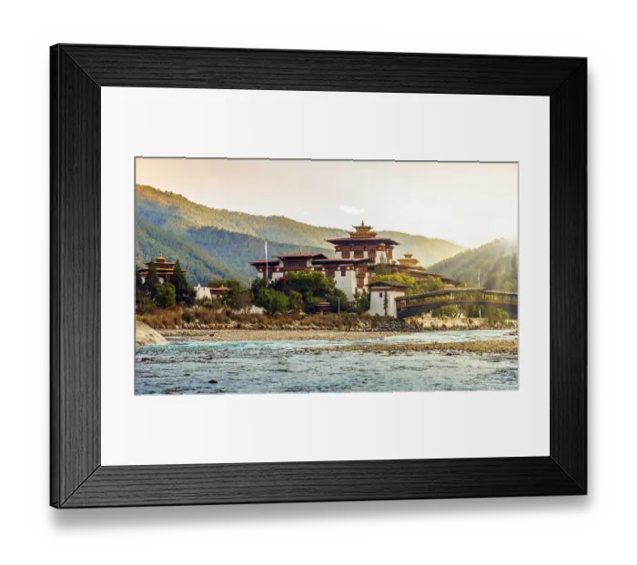 Framed Print : Punakha Dzong at sunset, with sunrays