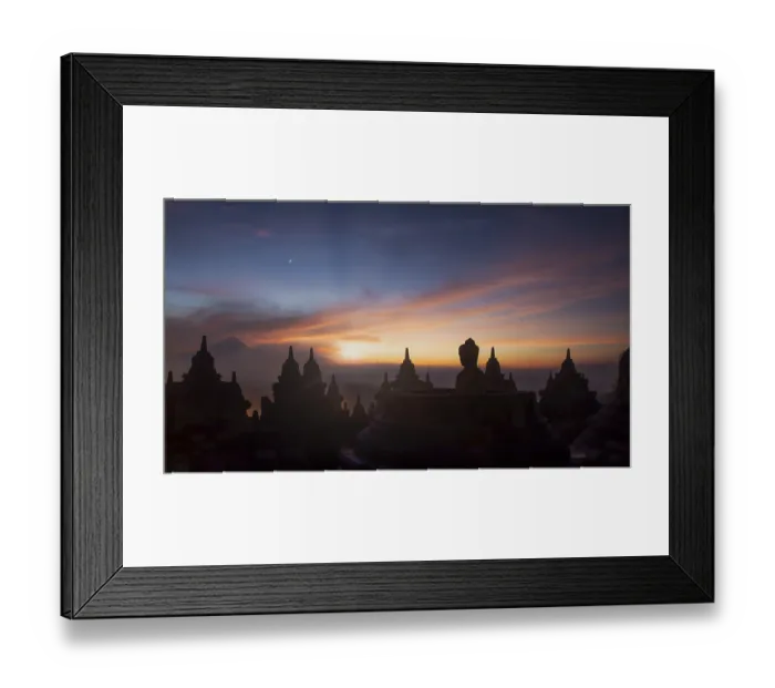 Framed Print : Buddha statue at sunrise, Borobudur temple complex Framed Print : Buddha statue at sunrise, Borobudur temple complex