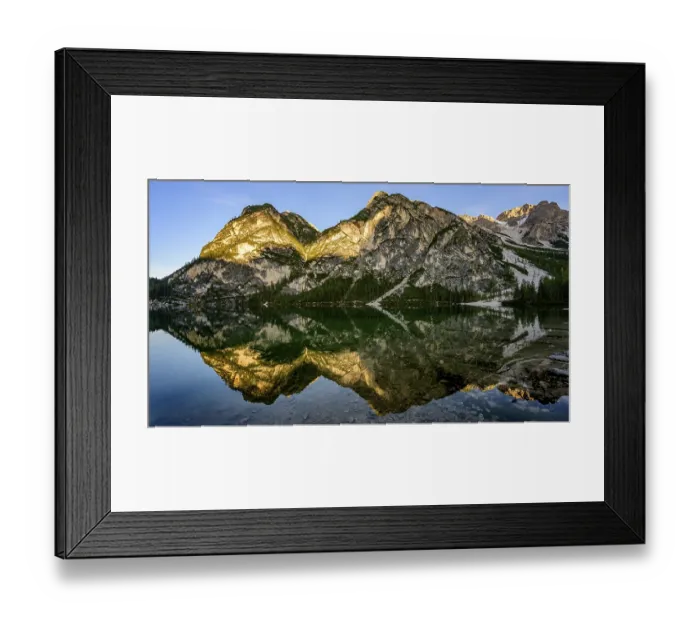 Framed Print : Mountains in the evening light are reflected in Lake Prags Lake