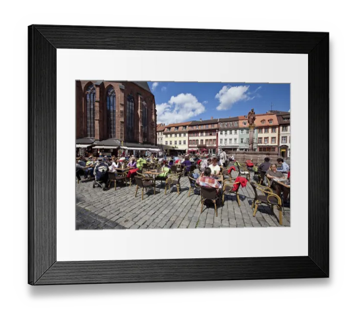Framed Print : Tourists enjoying the sunshine in the old market square with the Herkulesbrunnen