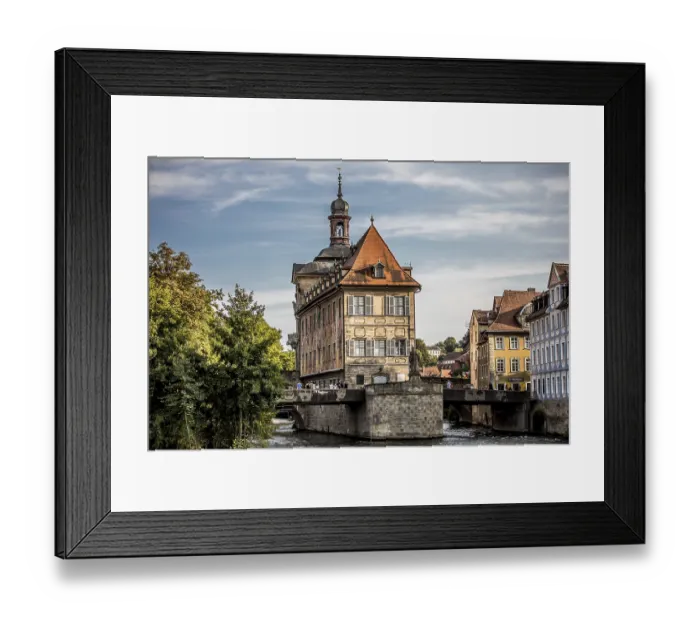 Framed Print : Imposing half-timbered house on a bridge with clear colours Framed Print : Imposing half-timbered house on a bridge with clear colours