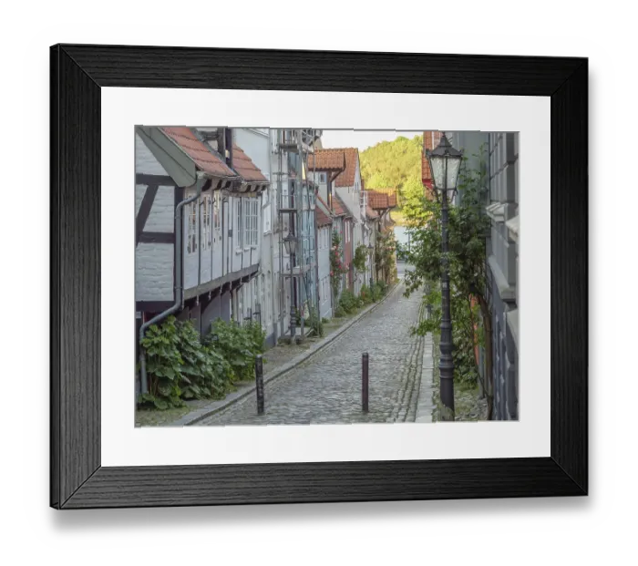 Framed Print : A cobbled street in an old town